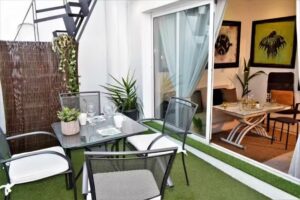 &Aacute;tico de Arte Ba&ntilde;ado en Sol