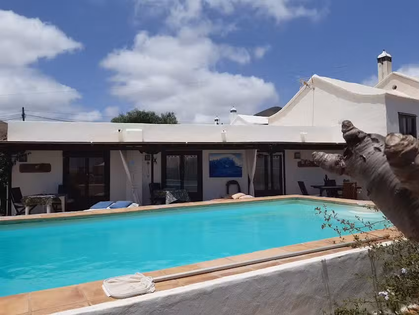 T&iacute;as Habitaciones de Hotel en Chalet T&iacute;pico